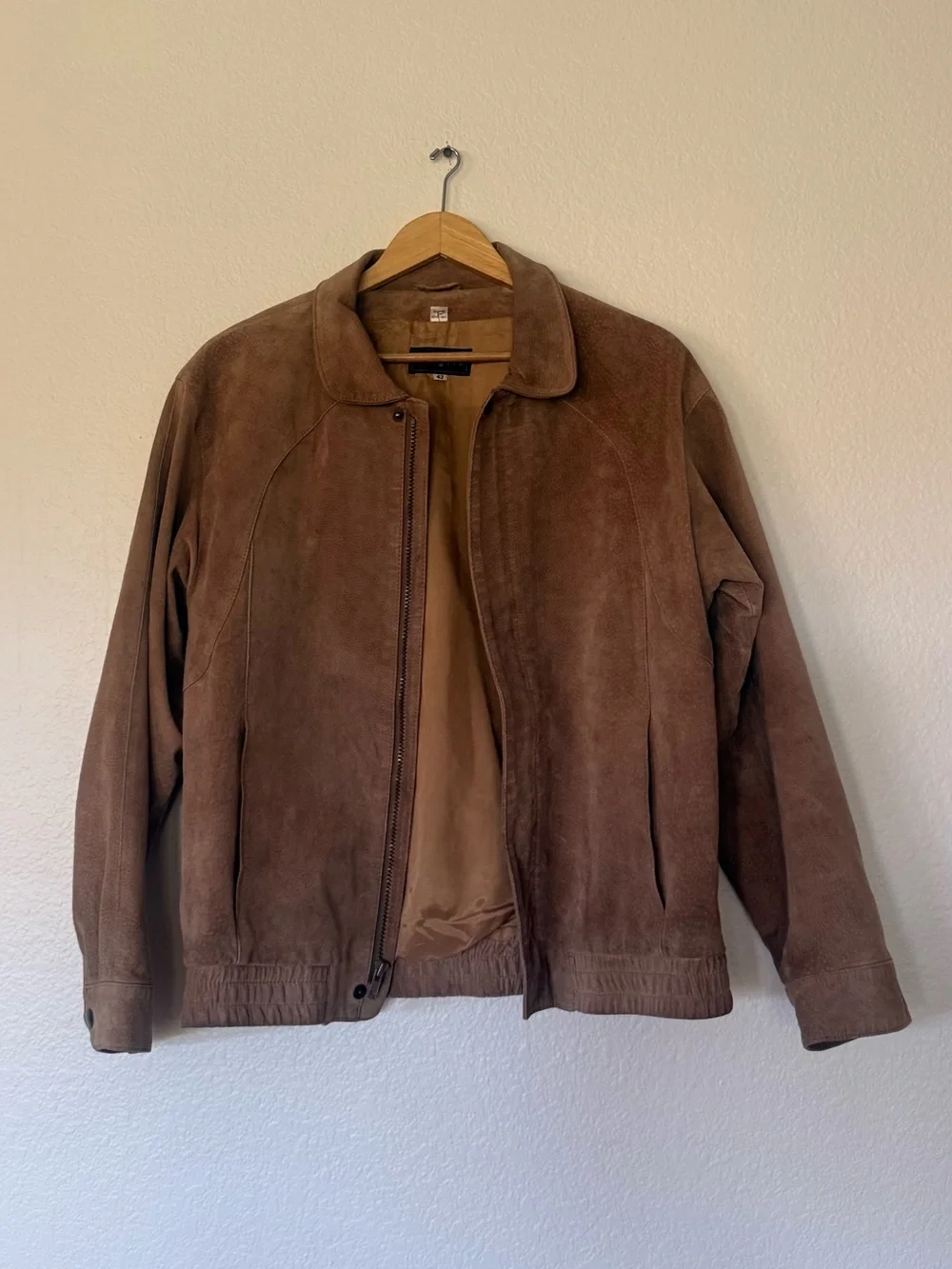 Tan leather bomber jacket